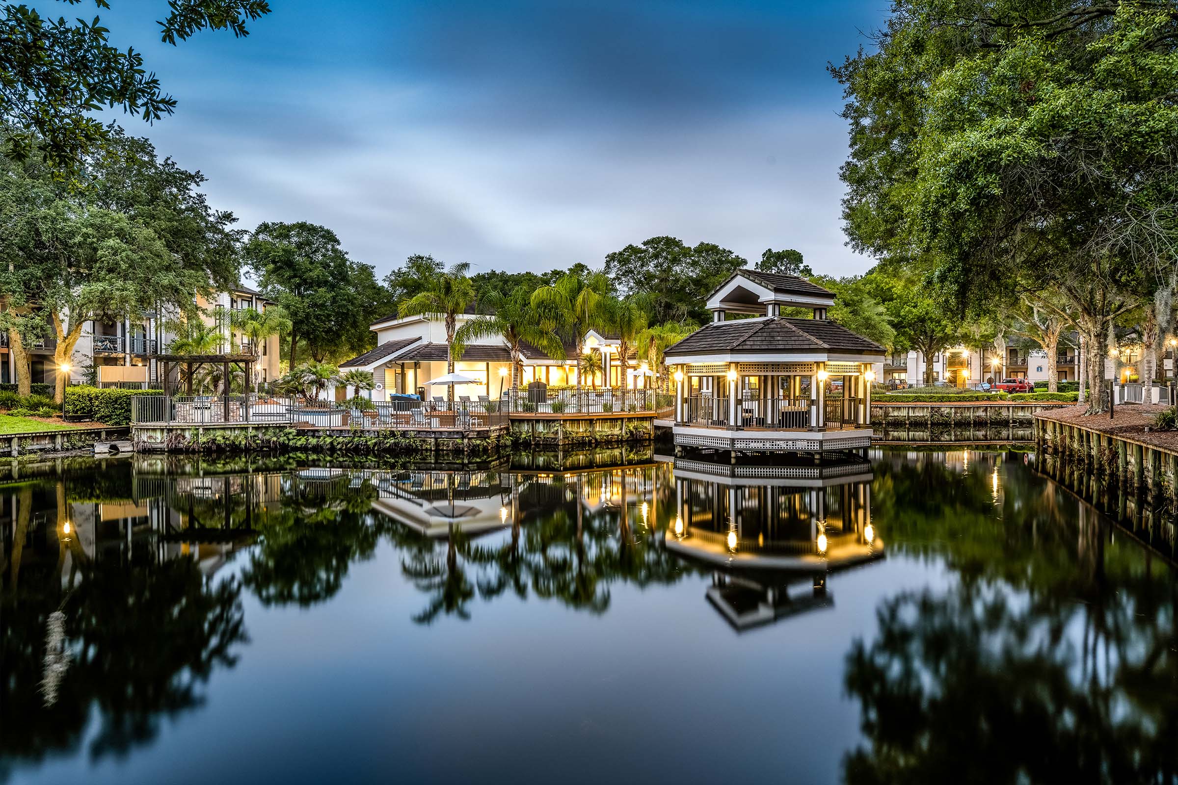 Evening view of the gazebos and clubhouse at the Meridian