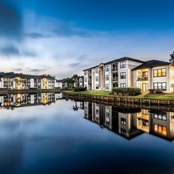 Lake and exterior of the Meridian, apartment homes in Jacksonville FL